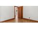 Bedroom with wood trim and door leading to another room at 3899 Warrenton Rd, Henderson, NC 27537