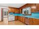 A functional kitchen featuring ample cabinetry and modern appliances providing everything for culinary exploration at 3899 Warrenton Rd, Henderson, NC 27537