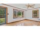 Bright living room featuring hardwood floors, neutral walls, and natural light creating a comfortable atmosphere at 3899 Warrenton Rd, Henderson, NC 27537