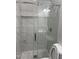 Bathroom shower stall with glass door and rainfall shower head at 409 S Flanner St St, Burlington, NC 27215