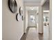 Inviting foyer with hardwood floors, decorative wall art, and a view to the front door at 48 Spirit Springs Rd, Smithfield, NC 27577