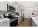 Stainless steel appliances and ample counter space in this kitchen make cooking and baking a joy at 48 Spirit Springs Rd, Smithfield, NC 27577