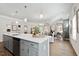 Open kitchen layout with a large island that overlooks the open dining and living area at 48 Spirit Springs Rd, Smithfield, NC 27577