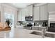 Modern kitchen features stainless appliances and grey cabinets with lots of storage space and natural light at 48 Spirit Springs Rd, Smithfield, NC 27577