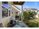 Back porch with chairs and a view of the lawn at 49 Salt Cedar Ln, Chapel Hill, NC 27516