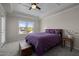 Bedroom with tray ceiling, carpet and large window that lets in lots of natural light at 49 Salt Cedar Ln, Chapel Hill, NC 27516