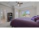 Bedroom featuring a tray ceiling, a window with view, and built in shelves at 49 Salt Cedar Ln, Chapel Hill, NC 27516