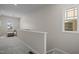Hallway with a window overlooking the neighborhood at 49 Salt Cedar Ln, Chapel Hill, NC 27516