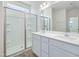 Modern bathroom with double vanity and large glass shower at 504 Winding Creek Dr Dr, Lillington, NC 27546