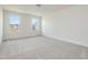 Bright bedroom with two windows and neutral colored carpet at 504 Winding Creek Dr Dr, Lillington, NC 27546