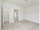 Large bedroom with open doorway to en-suite bathroom and walk-in closet at 504 Winding Creek Dr Dr, Lillington, NC 27546