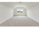 Bright bonus room with two windows, and neutral carpet at 504 Winding Creek Dr Dr, Lillington, NC 27546
