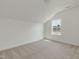 Spacious bonus room with bright natural light and vaulted ceilings at 504 Winding Creek Dr Dr, Lillington, NC 27546