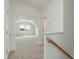 Upstairs hallway leading to carpeted rooms with an attic ceiling at 504 Winding Creek Dr Dr, Lillington, NC 27546