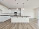 Bright kitchen with granite countertops, an island, and stainless steel appliances at 504 Winding Creek Dr Dr, Lillington, NC 27546