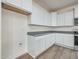 Modern kitchen showcases white cabinets, granite countertops and stainless steel appliances at 504 Winding Creek Dr Dr, Lillington, NC 27546