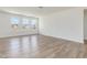 Bright and airy living room with large windows and natural light beaming through at 504 Winding Creek Dr Dr, Lillington, NC 27546