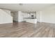 Spacious living room showcases wood-look floors, staircase, and an open floor plan at 504 Winding Creek Dr Dr, Lillington, NC 27546