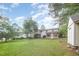 Expansive backyard with mature trees and lawn, great for outdoor enjoyment at 515 Poplar Dr, Raleigh, NC 27603