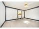 Bright bedroom with neutral carpet, window for natural light, and decorative border at 515 Poplar Dr, Raleigh, NC 27603