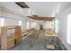 Unfinished garage space offers storage and workshop potential at 515 Poplar Dr, Raleigh, NC 27603