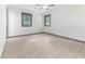 Updated bedroom with hardwood floors and new windows showing off lots of natural light at 522 Lochness Ln, Cary, NC 27511