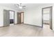 Neutral bedroom with updated flooring and view to en-suite bathroom and closets at 522 Lochness Ln, Cary, NC 27511