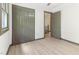 Updated bedroom showcases bi-fold closet and a connecting door to another room at 522 Lochness Ln, Cary, NC 27511