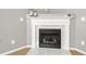 Elegant fireplace with marble surround and decorative mantel at 524 Woodson Dr, Clayton, NC 27527