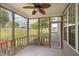 View from the screened-in back porch to green lawn and landscaping, enjoy outdoor living! at 524 Woodson Dr, Clayton, NC 27527