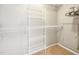 Walk-in closet with wire shelving and ample storage space, ready to be organized at 524 Woodson Dr, Clayton, NC 27527