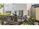 View of an outdoor deck featuring a grill and decorative string lights, perfect for entertaining and enjoying the outdoors at 535 W Holding Ave, Wake Forest, NC 27587