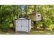 Backyard shed and treehouse at 535 W Holding Ave, Wake Forest, NC 27587