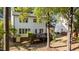 Exterior view of home with a patio and trees at 535 W Holding Ave, Wake Forest, NC 27587