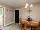 Charming dining area with stylish decor and a door to the deck at 70 King Mackeral Ct, Willow Springs, NC 27592