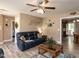 Comfortable living room features hardwood floors, plush seating, and natural light at 70 King Mackeral Ct, Willow Springs, NC 27592