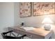 Study Nook area with desk, chair and lamp, conveniently situated near bright bedroom at 702 Beacon Hill Rd # 51, Lillington, NC 27546