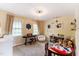 Bright bedroom with soft, neutral décor, a comfortable bed, and lots of room to relax and play at 7804 Tylerton Dr, Raleigh, NC 27613