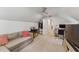 Finished attic bedroom features neutral decor and lots of natural light, perfect for relaxing at 7804 Tylerton Dr, Raleigh, NC 27613