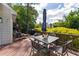 Enjoy outdoor living on the spacious deck, complete with dining and seating areas amid lush greenery at 7804 Tylerton Dr, Raleigh, NC 27613