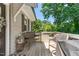 Back porch area with outdoor seating, perfect for relaxing at 827 Loop Rd Rd, Burlington, NC 27217