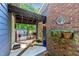 Cozy covered back porch and lush landscape view enhance outdoor living space at 8513 Applecross Cir, Apex, NC 27539