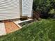 Beautiful brick patio and planting area add charm to this home's outdoor space at 9009 Miranda Dr, Raleigh, NC 27617