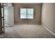 Bright bedroom with neutral carpet and natural light at 9009 Miranda Dr, Raleigh, NC 27617