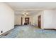 Spacious living room featuring an open layout with updated flooring and natural light at 1012 Roxboro St, Haw River, NC 27258