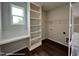 Walk-in pantry with built-in shelving and a small desk or countertop at 107 Legolas Ct, Middlesex, NC 27557