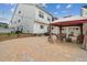 This backyard includes a gazebo, seating, and stylish pavers at 1211 Gloriosa St, Apex, NC 27523