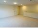 Bonus room with neutral carpeting and lighting at 1211 Gloriosa St, Apex, NC 27523