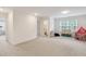 Spacious bonus room with neutral carpeting, ample natural light, and a playful atmosphere at 1211 Gloriosa St, Apex, NC 27523