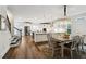 Bright and spacious kitchen with stainless steel appliances, island, and adjacent dining area at 1211 Gloriosa St, Apex, NC 27523